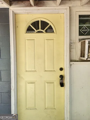 a front view of a house with a door