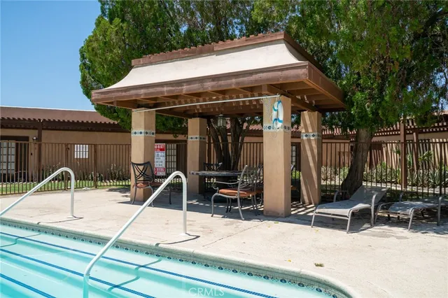 a view of outdoor kitchen and dining room