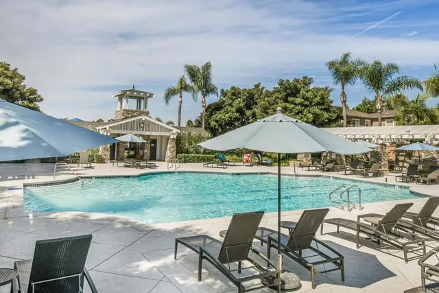 an outdoor space with furniture and garden view