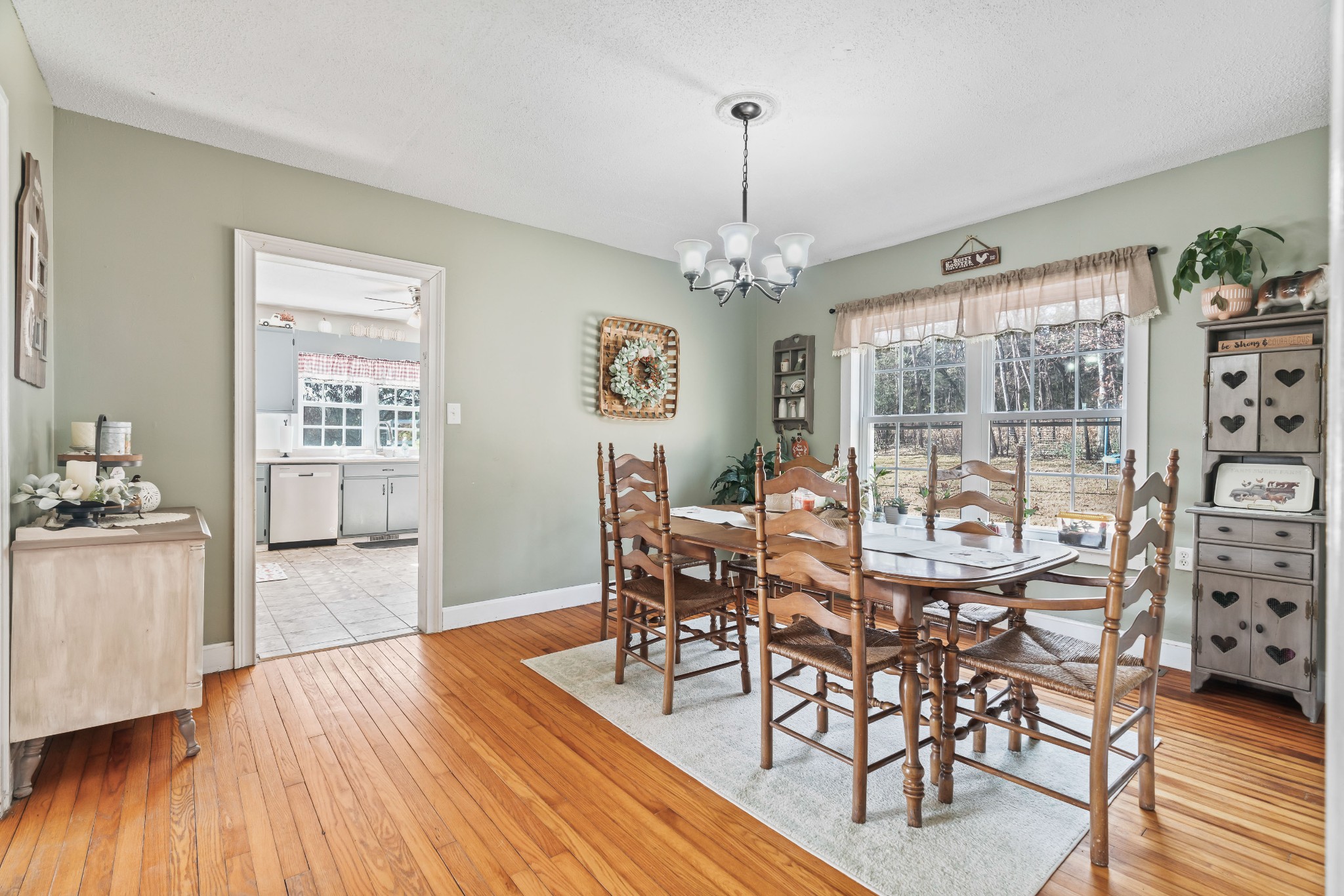 345 Wabash Road Mulberry, TN 37359 - Photo 14 of 63 a view of a dining room with furniture wooden floor and chandelier