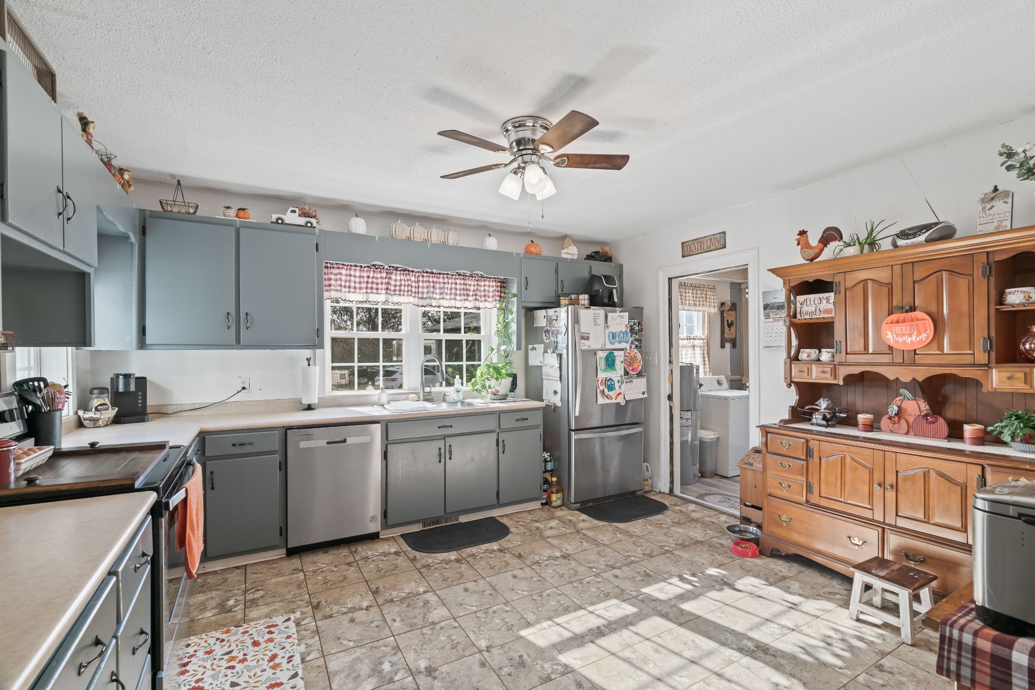 345 Wabash Road Mulberry, TN 37359 - Photo 16 of 63 a kitchen with stainless steel appliances a stove a sink a refrigerator and cabinets