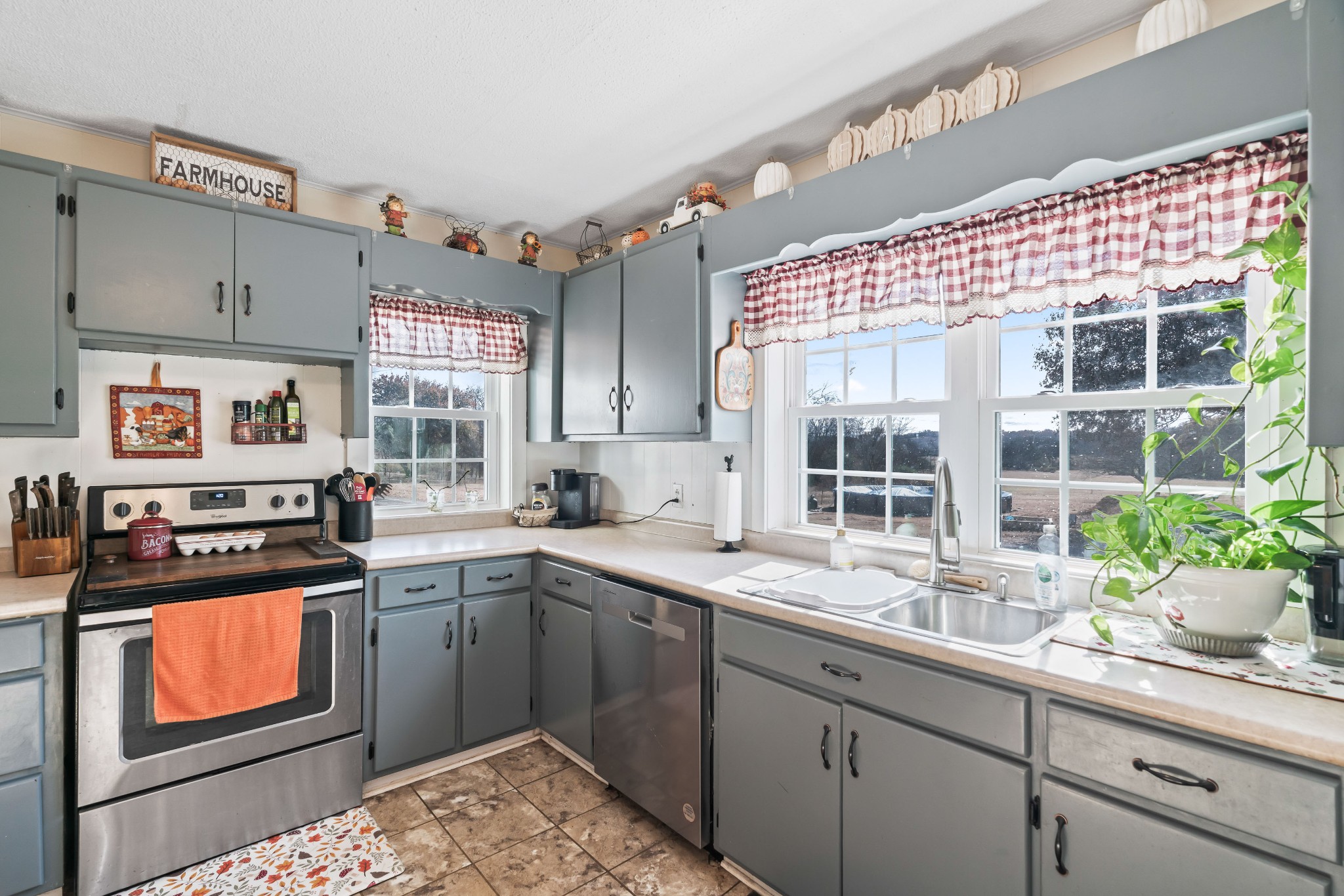 345 Wabash Road Mulberry, TN 37359 - Photo 19 of 63 a kitchen with a sink stove and cabinets
