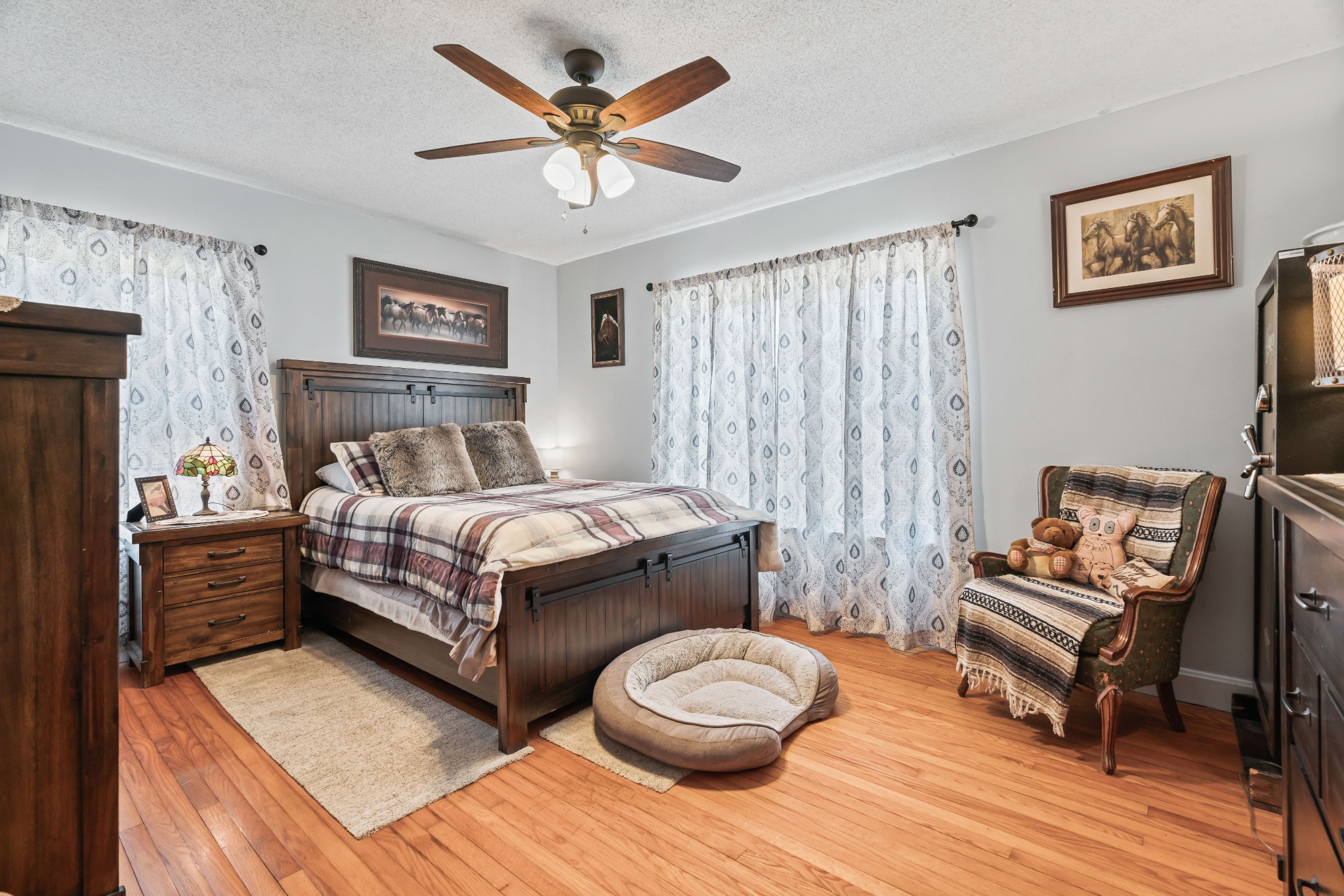345 Wabash Road Mulberry, TN 37359 - Photo 24 of 63 a bedroom with a bed and a chandelier