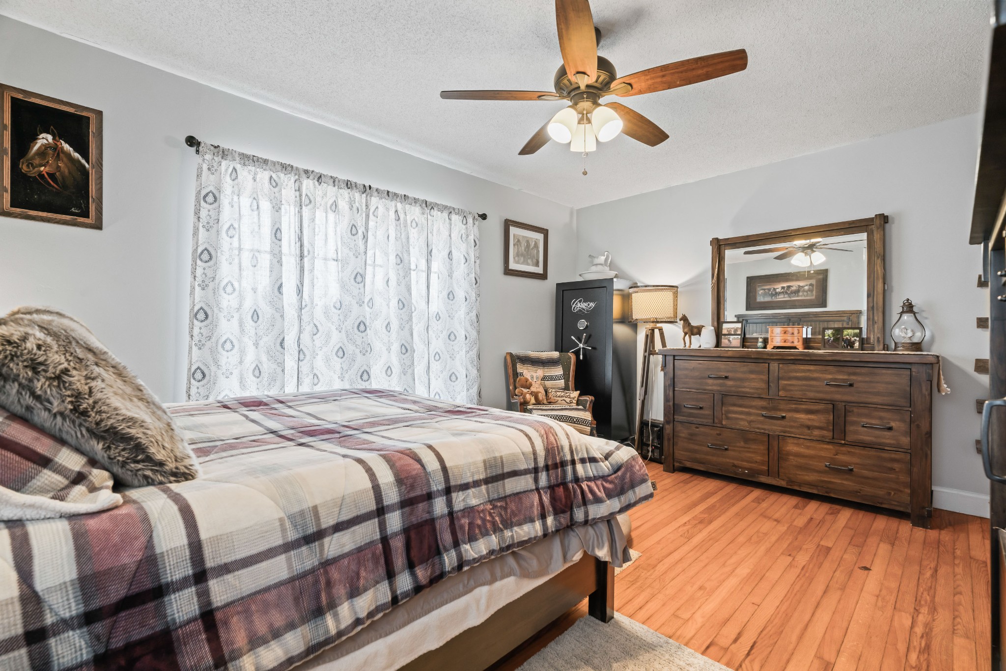 345 Wabash Road Mulberry, TN 37359 - Photo 25 of 63 a bedroom with a bed and wooden floor