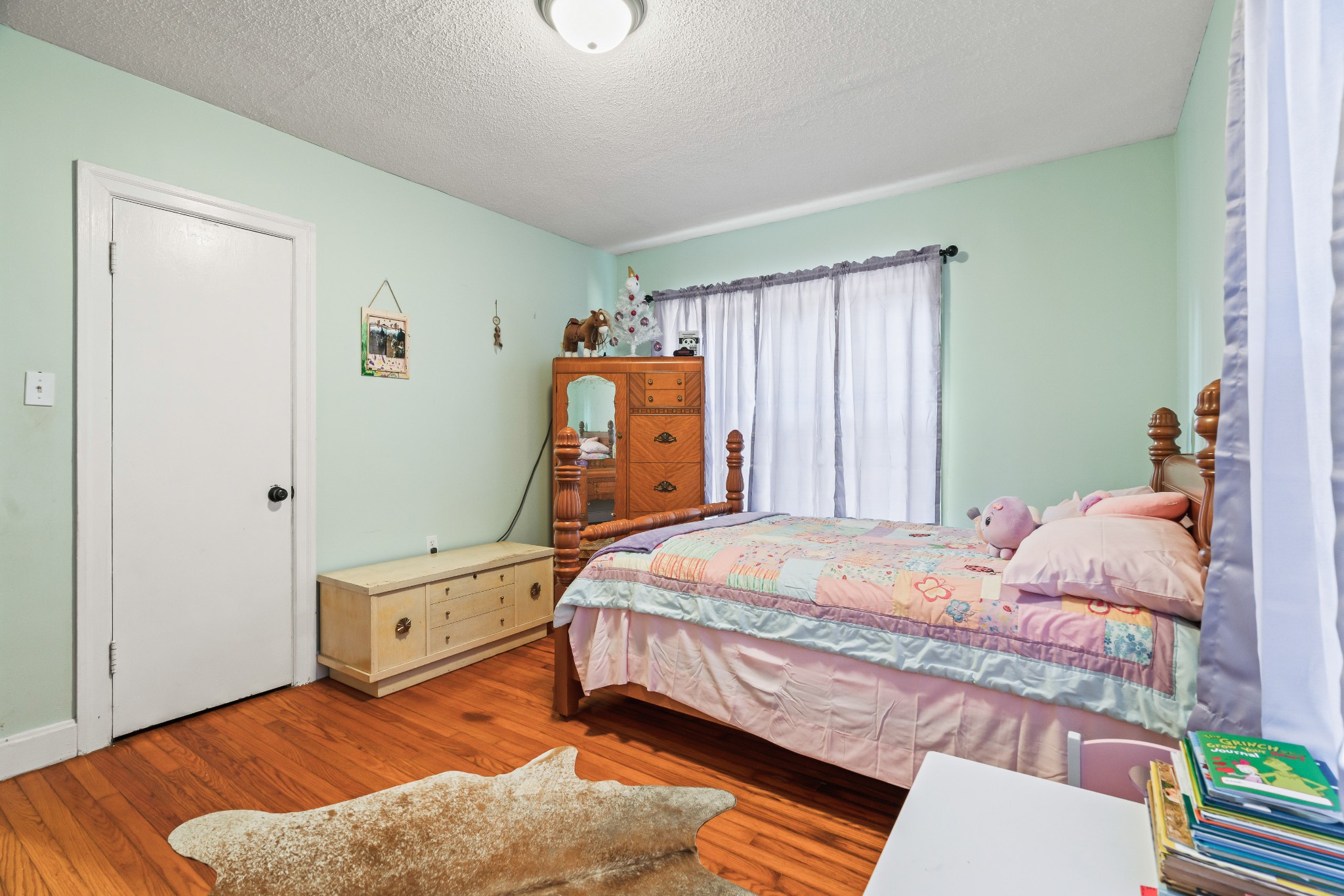 345 Wabash Road Mulberry, TN 37359 - Photo 27 of 63 a bedroom with a bed and wooden floor