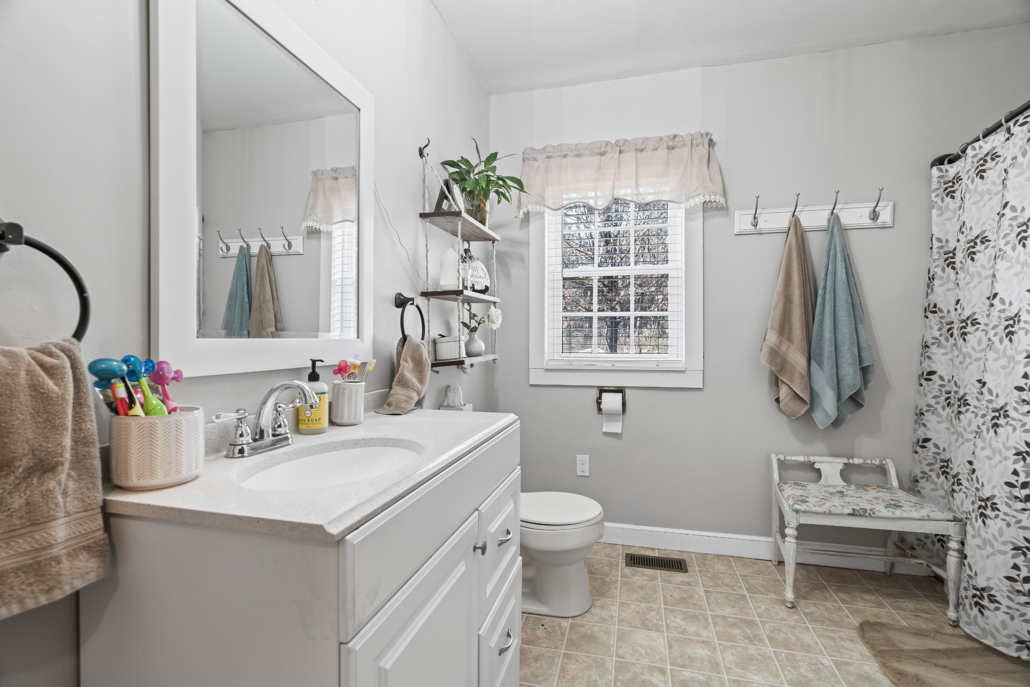 345 Wabash Road Mulberry, TN 37359 - Photo 28 of 63 a bathroom with a sink toilet and mirror