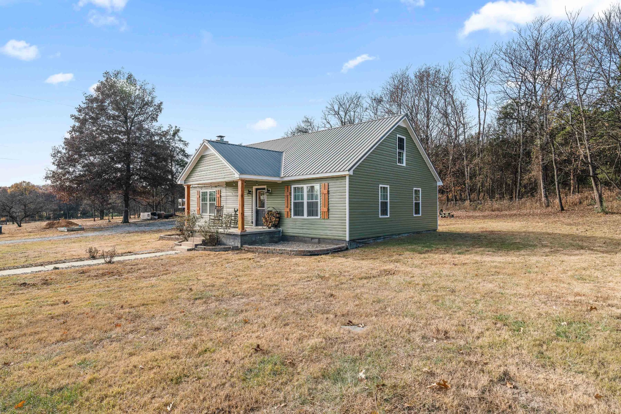 345 Wabash Road Mulberry, TN 37359 - Photo 3 of 63 a front view of a house with a yard
