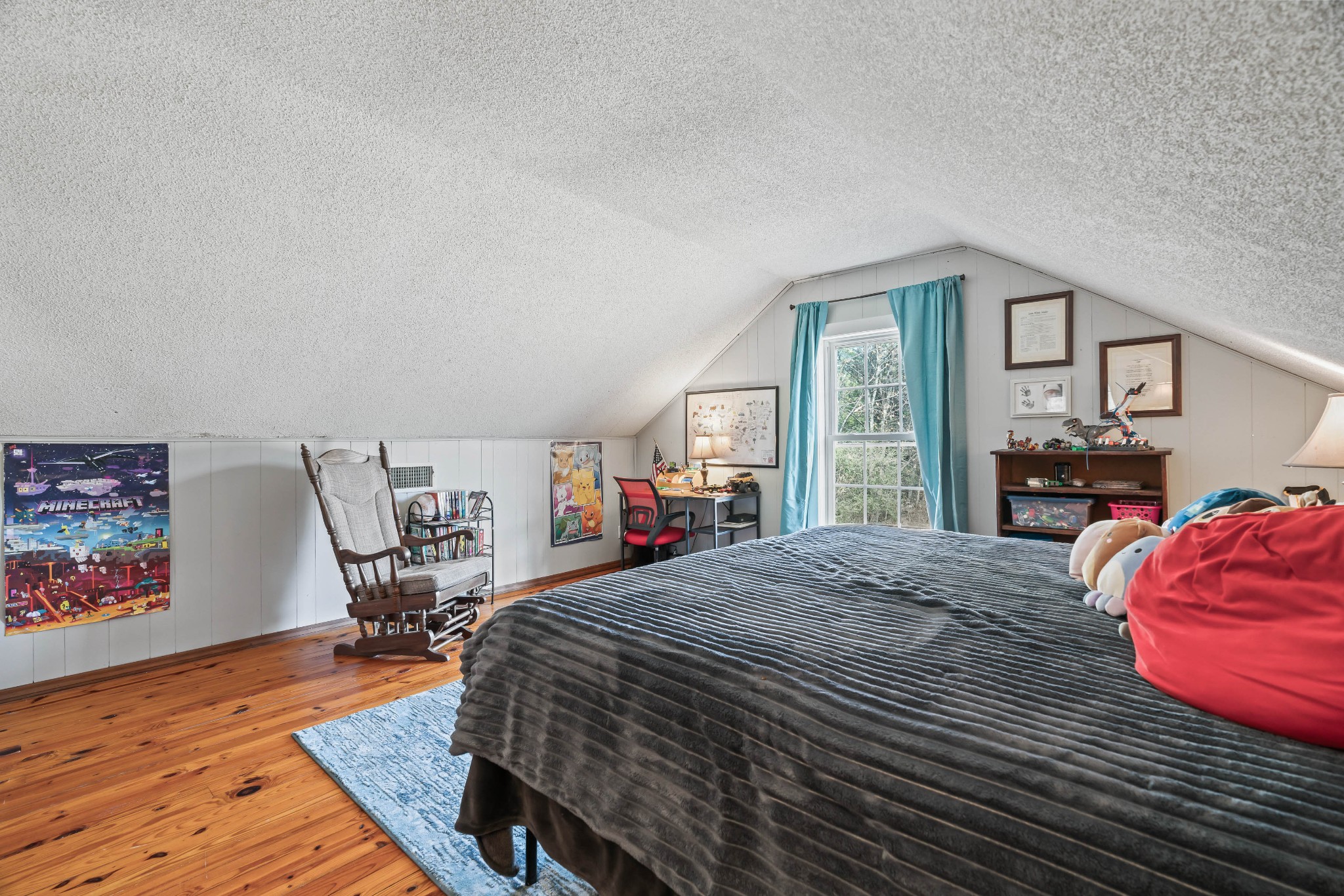 345 Wabash Road Mulberry, TN 37359 - Photo 34 of 63 a bedroom with a bed a dresser and book shelf