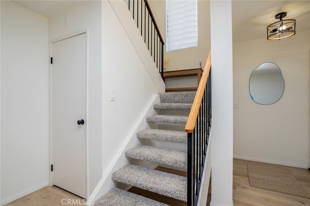 8025 70th Street Paramount, CA 90723 - Photo 16 of 31 a view of entryway and hall with wooden floor