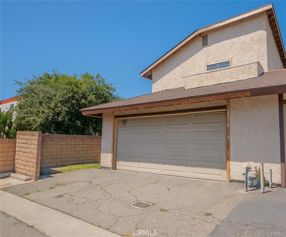 8025 70th Street Paramount, CA 90723 - Photo 29 of 31 a small white house with outdoor space