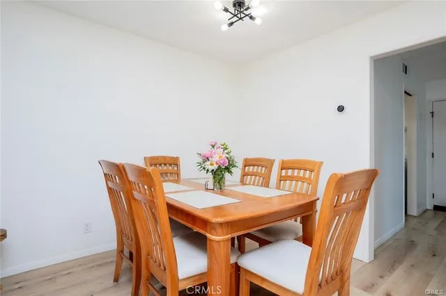 a kitchen with stainless steel appliances granite countertop a refrigerator stove a sink and dishwasher