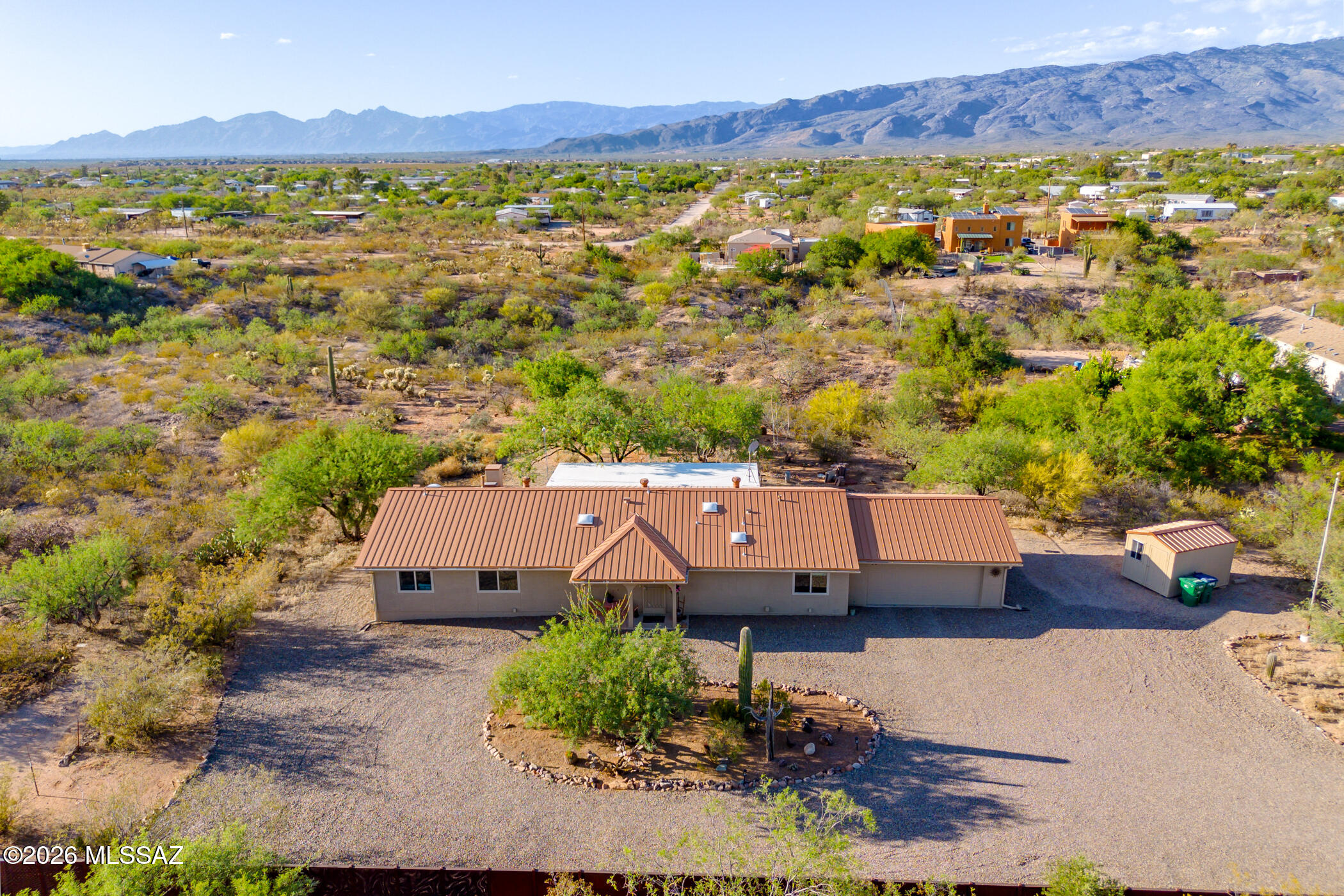 13599 East Rincon Ranch Road Vail, AZ 85641 - Photo 38 of 41 an aerial view of residential houses with outdoor space