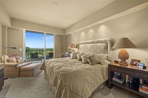 a bed room with a bed and a couch