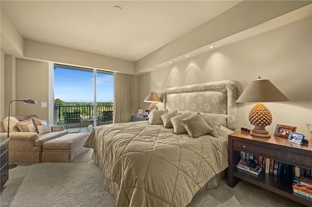 a bed room with a bed and a couch