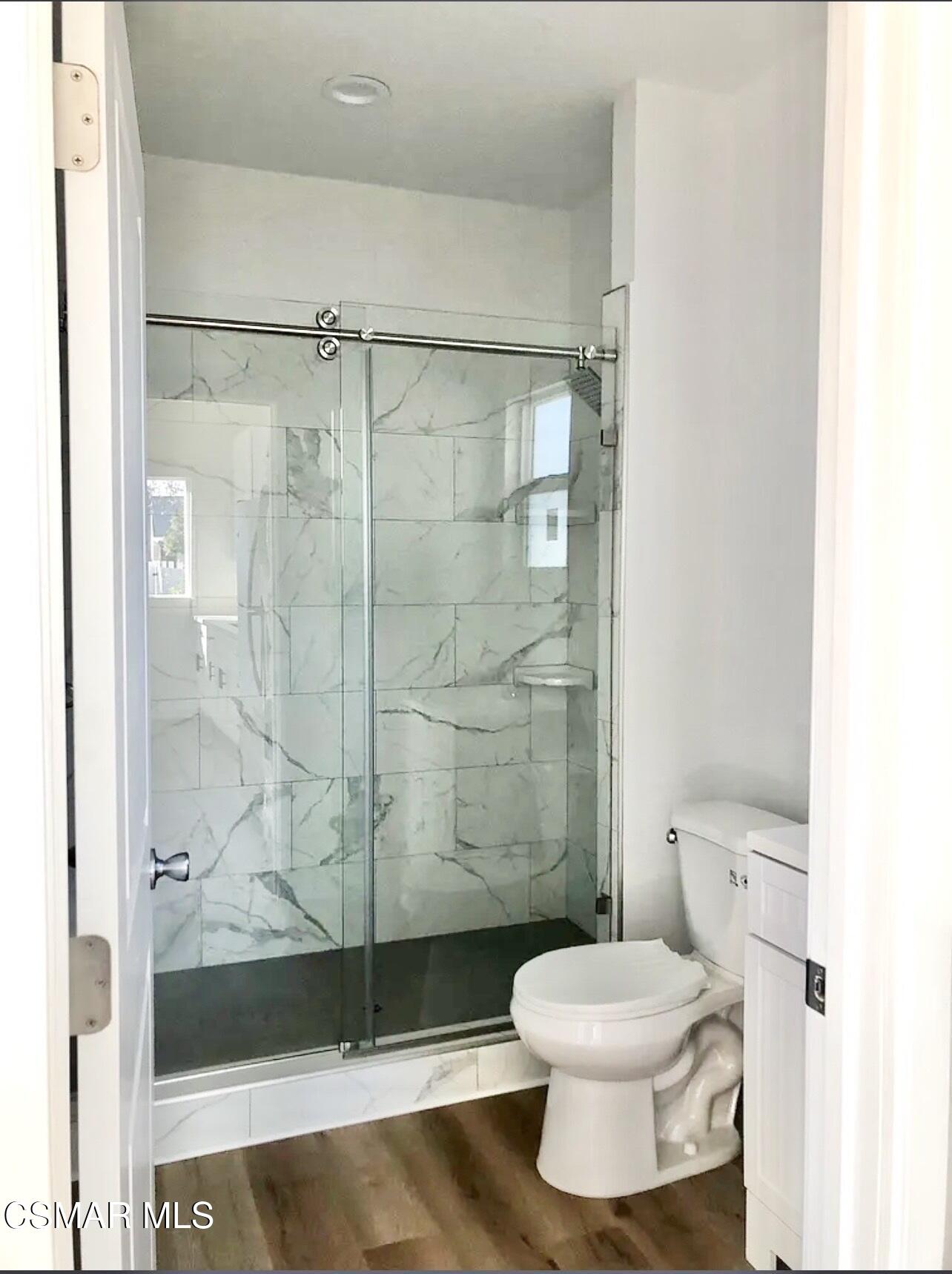 14083 La Rue Street San Fernando, CA 91340 - Photo 4 of 5 a bathroom with a toilet and a shower