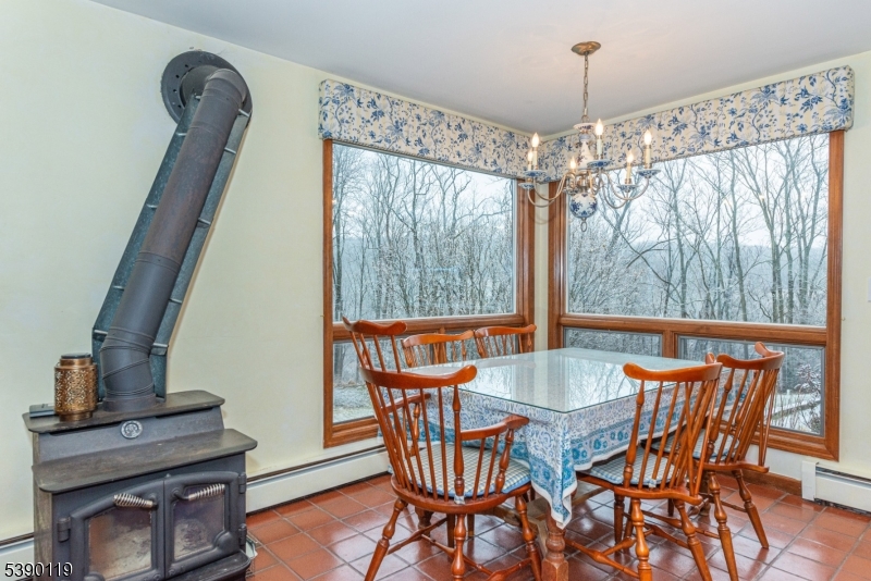 107 Clove Road, Unit 3 Wantage, NJ 07461 - Photo 11 of 45 a view of a dining room with furniture window and outside view