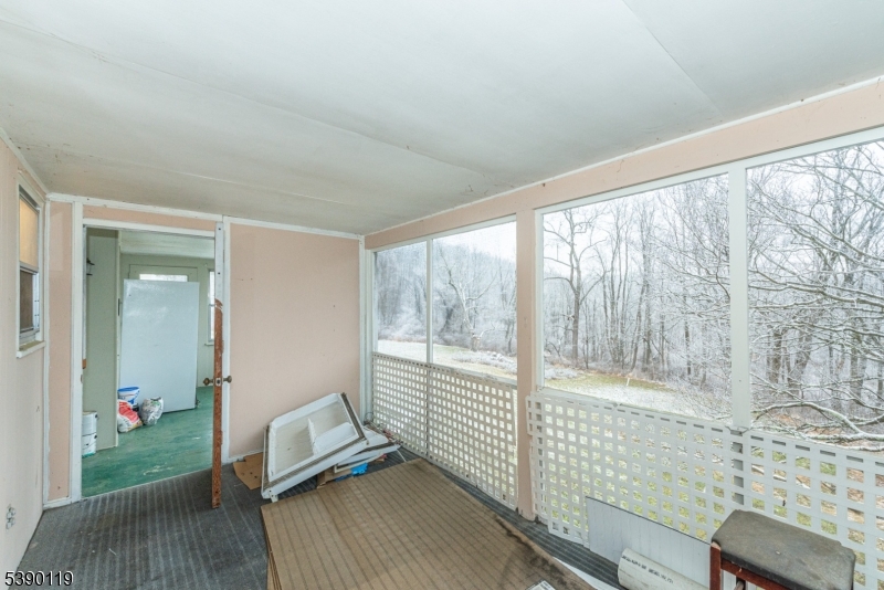 107 Clove Road, Unit 3 Wantage, NJ 07461 - Photo 34 of 45 a view of a room with wooden floor and windows