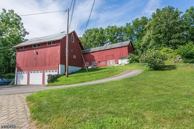 107 Clove Road, Unit 3 Wantage, NJ 07461 - Photo 36 of 45 a view of a back yard of the house