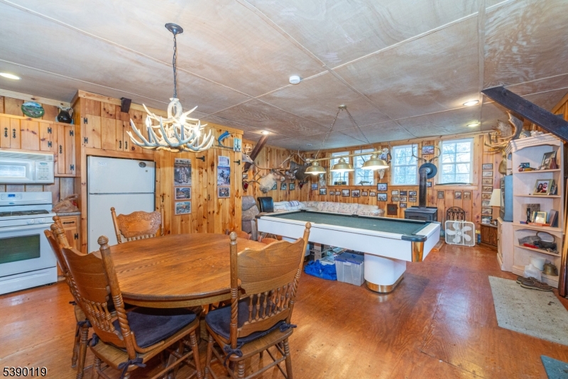 107 Clove Road, Unit 3 Wantage, NJ 07461 - Photo 37 of 45 a outdoor dining space with furniture and a view of city