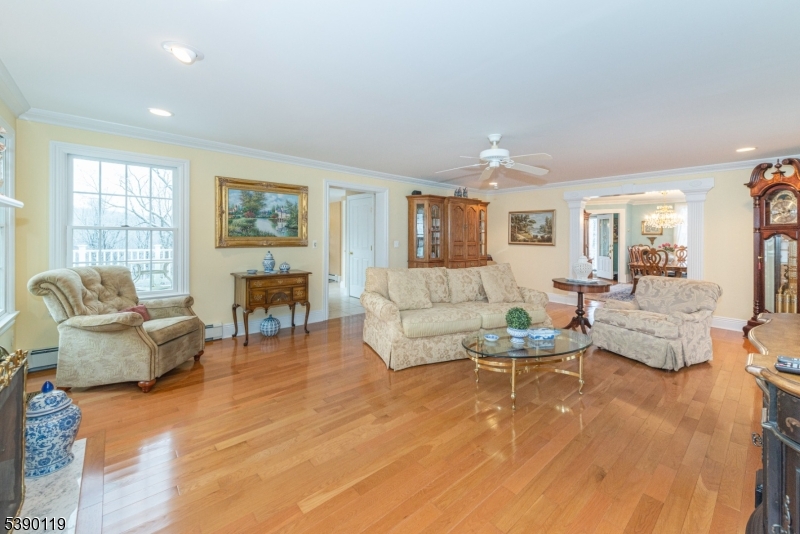 107 Clove Road, Unit 3 Wantage, NJ 07461 - Photo 7 of 45 a living room with furniture and a large window