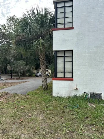 a front view of a house with yard
