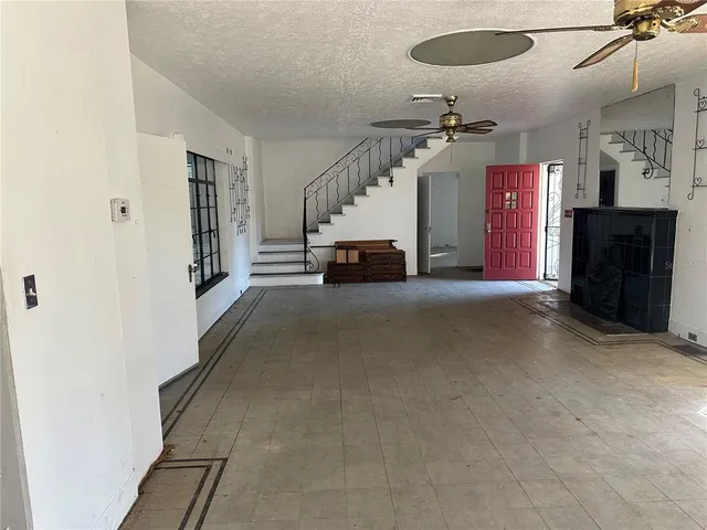 a view of a livingroom with a staircase