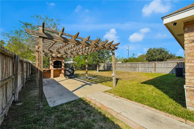 a view of a swimming pool with a lounge chairs