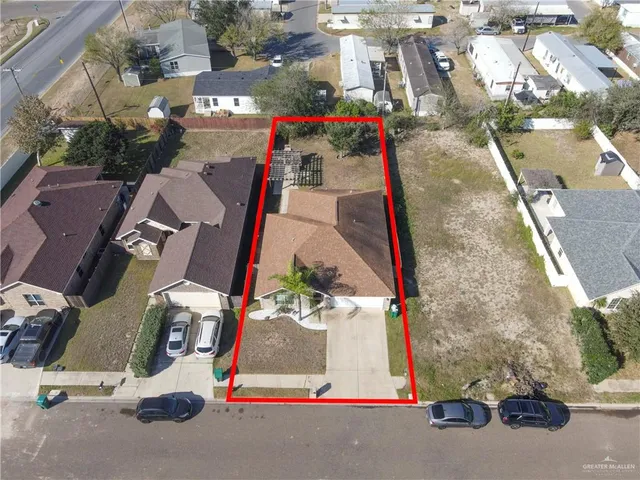 an aerial view of houses and roads