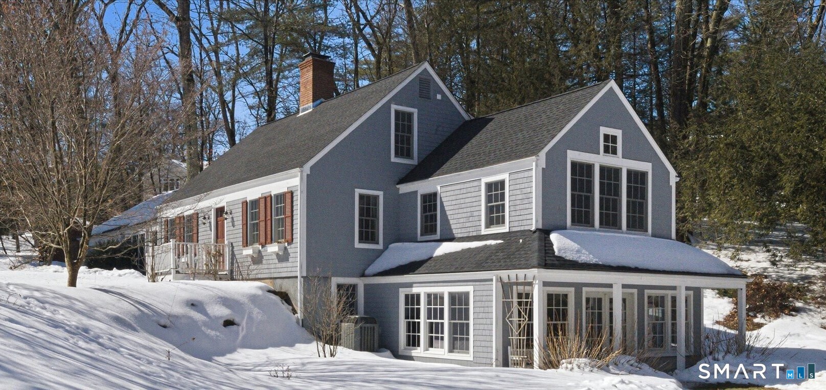 5 Shady Lane Simsbury, CT 06092 - Photo 1 of 1 a front view of a house with a yard and balcony