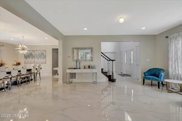 a living room with furniture and a table