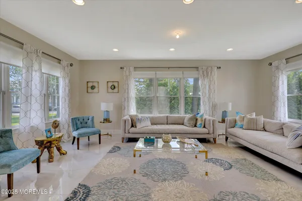 a view of a dining room with furniture window and outside view