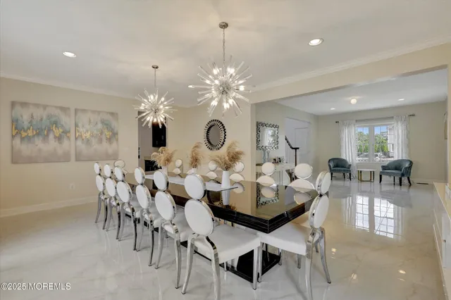 a large kitchen with cabinets and stainless steel appliances