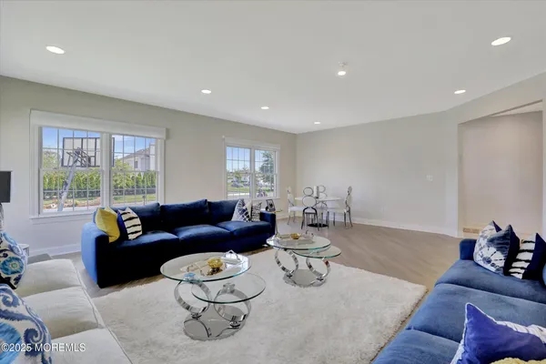 a view of living room with furniture and window