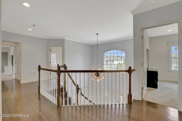 a bedroom with two beds and a window