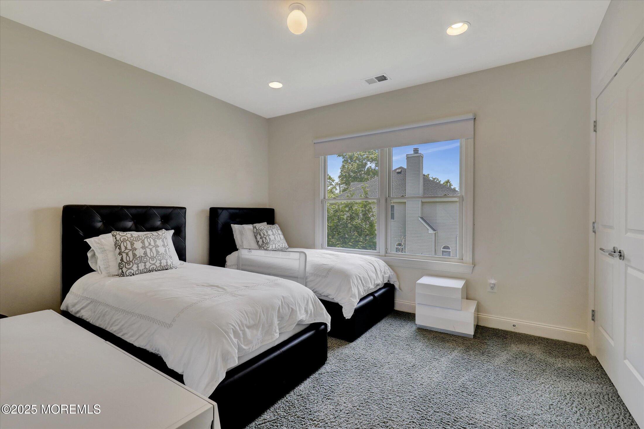 1 Country Club Drive Deal, NJ 07723 - Photo 46 of 65 a bedroom with two beds and a window