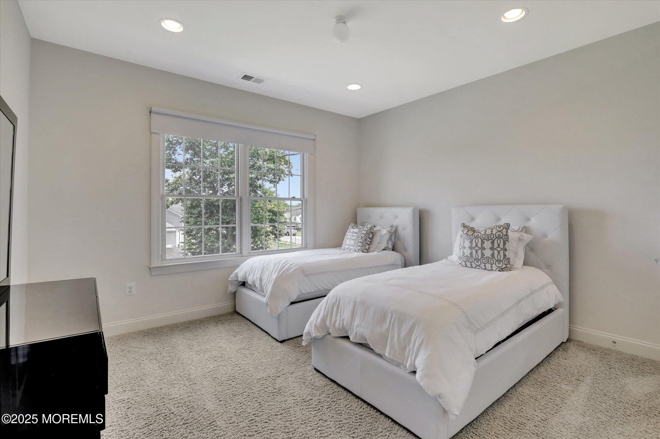 1 Country Club Drive Deal, NJ 07723 - Photo 48 of 65 a bedroom with two beds and a window