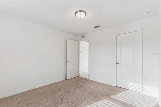 a bathroom with a bathtub shower sink and a toilet