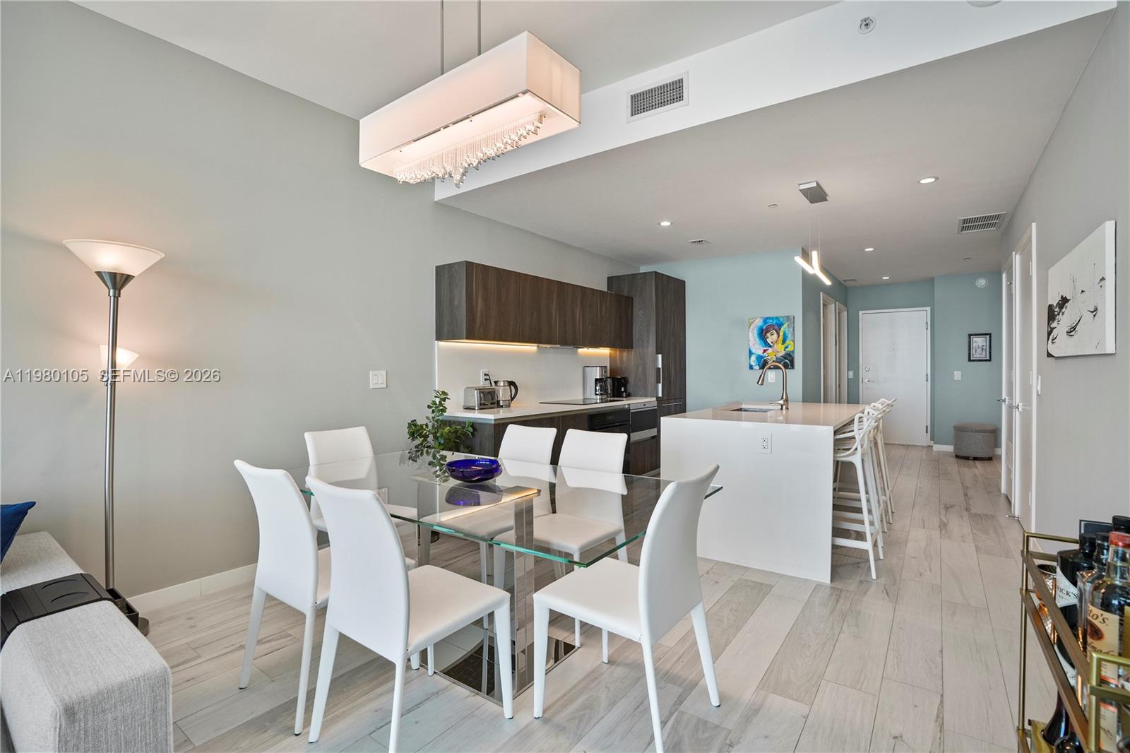 480 Northeast 31st Street, Unit 3906 Miami, FL 33137 - Photo 23 of 38 a view of a dining room with furniture