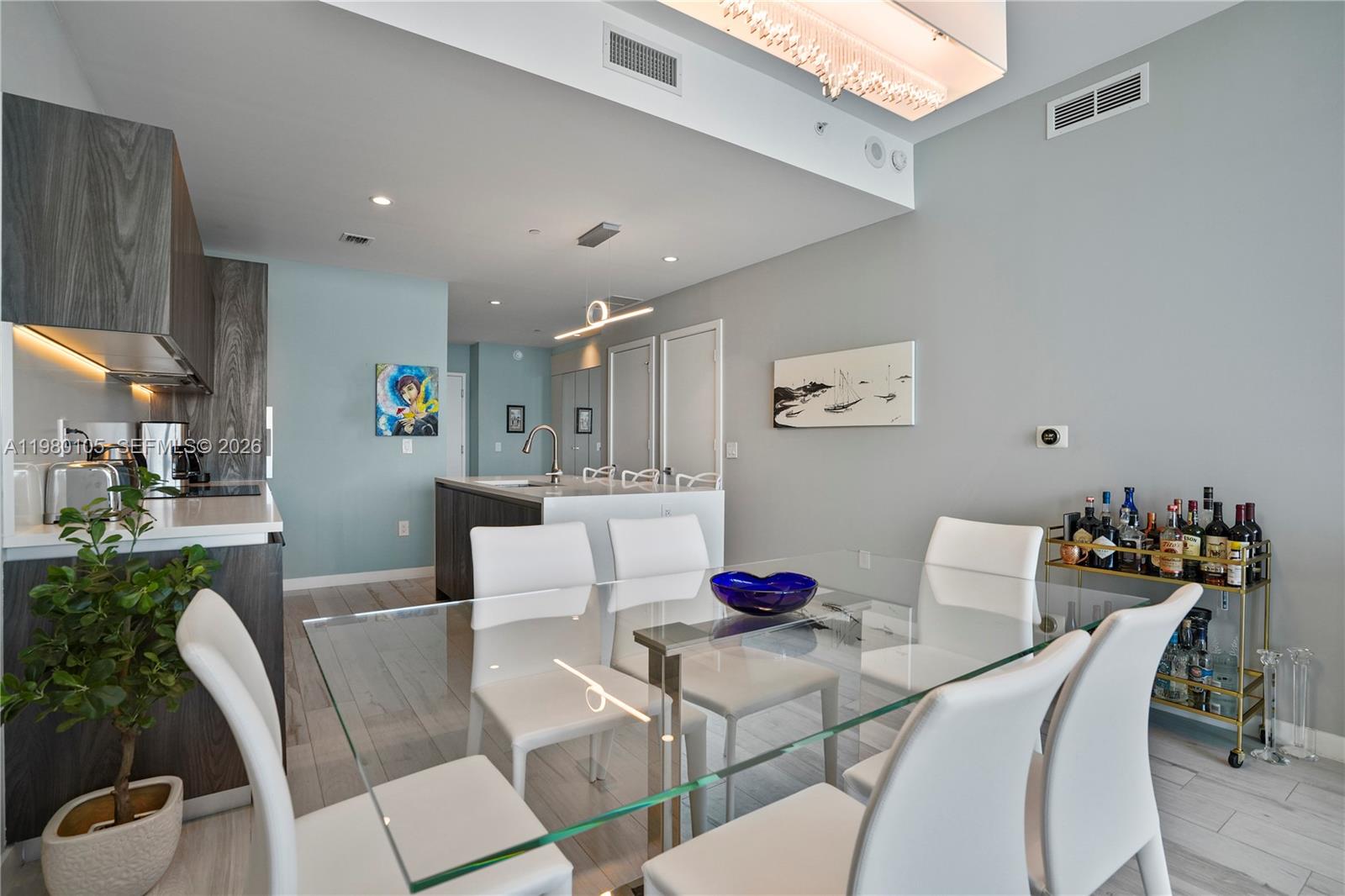 480 Northeast 31st Street, Unit 3906 Miami, FL 33137 - Photo 24 of 38 a view of a dining room with furniture