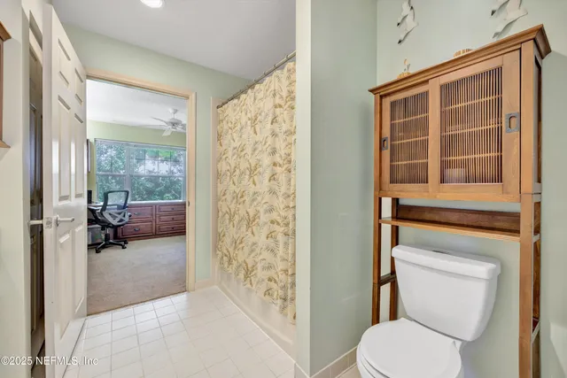 a bathroom with a double vanity sink mirror and
