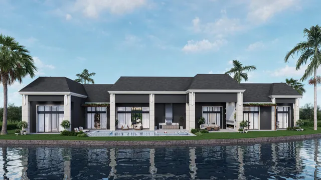 front view of a brick house with a yard