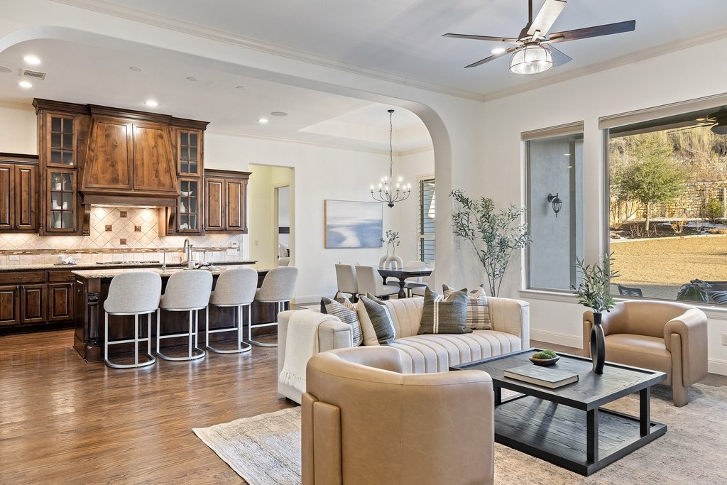 5804 Davenport Divide Road Austin, TX 78738 - Photo 11 of 40 a living room with furniture a large window and a table