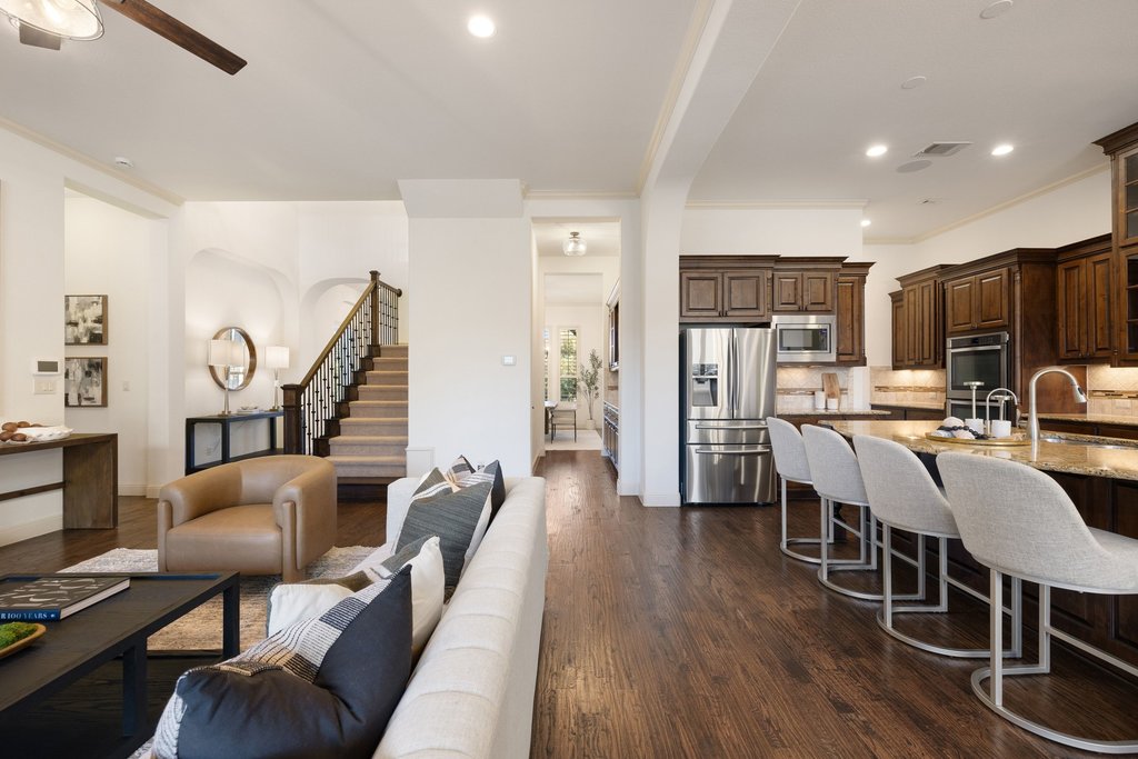 5804 Davenport Divide Road Austin, TX 78738 - Photo 12 of 40 a view of kitchen with cabinets and wooden floor