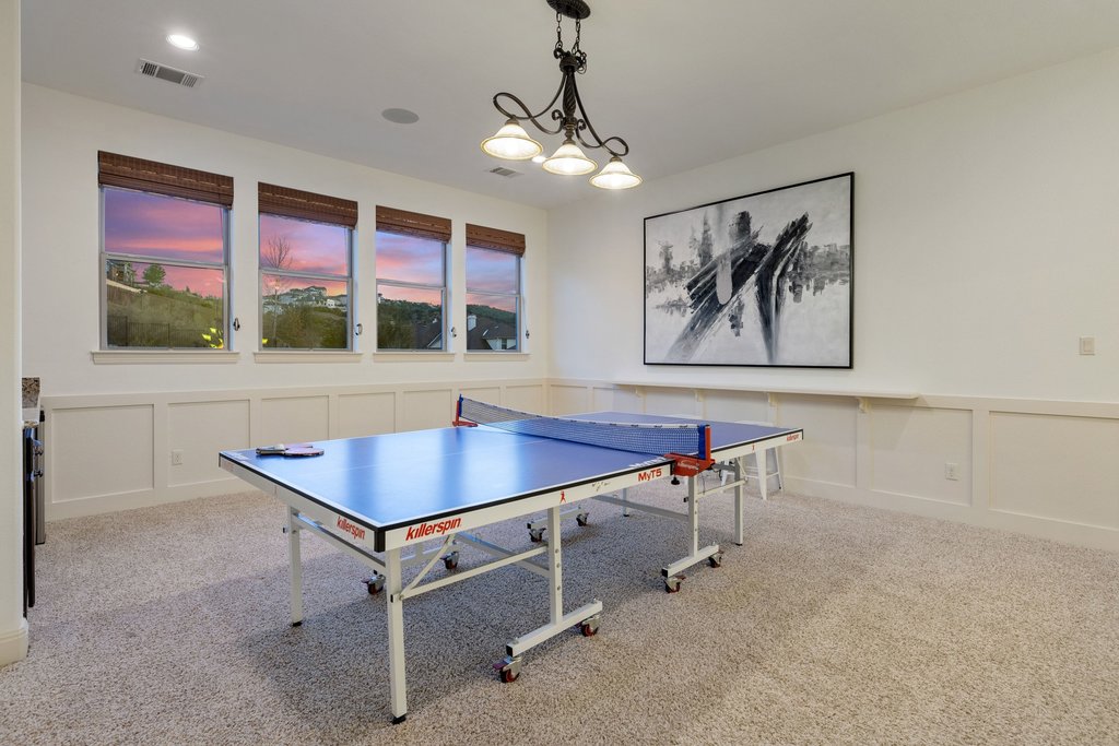 5804 Davenport Divide Road Austin, TX 78738 - Photo 25 of 40 a room with furniture and window