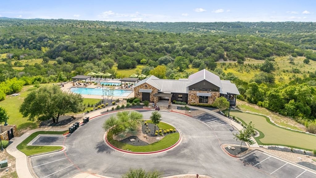 5804 Davenport Divide Road Austin, TX 78738 - Photo 38 of 40 a view of a swimming pool with a garden