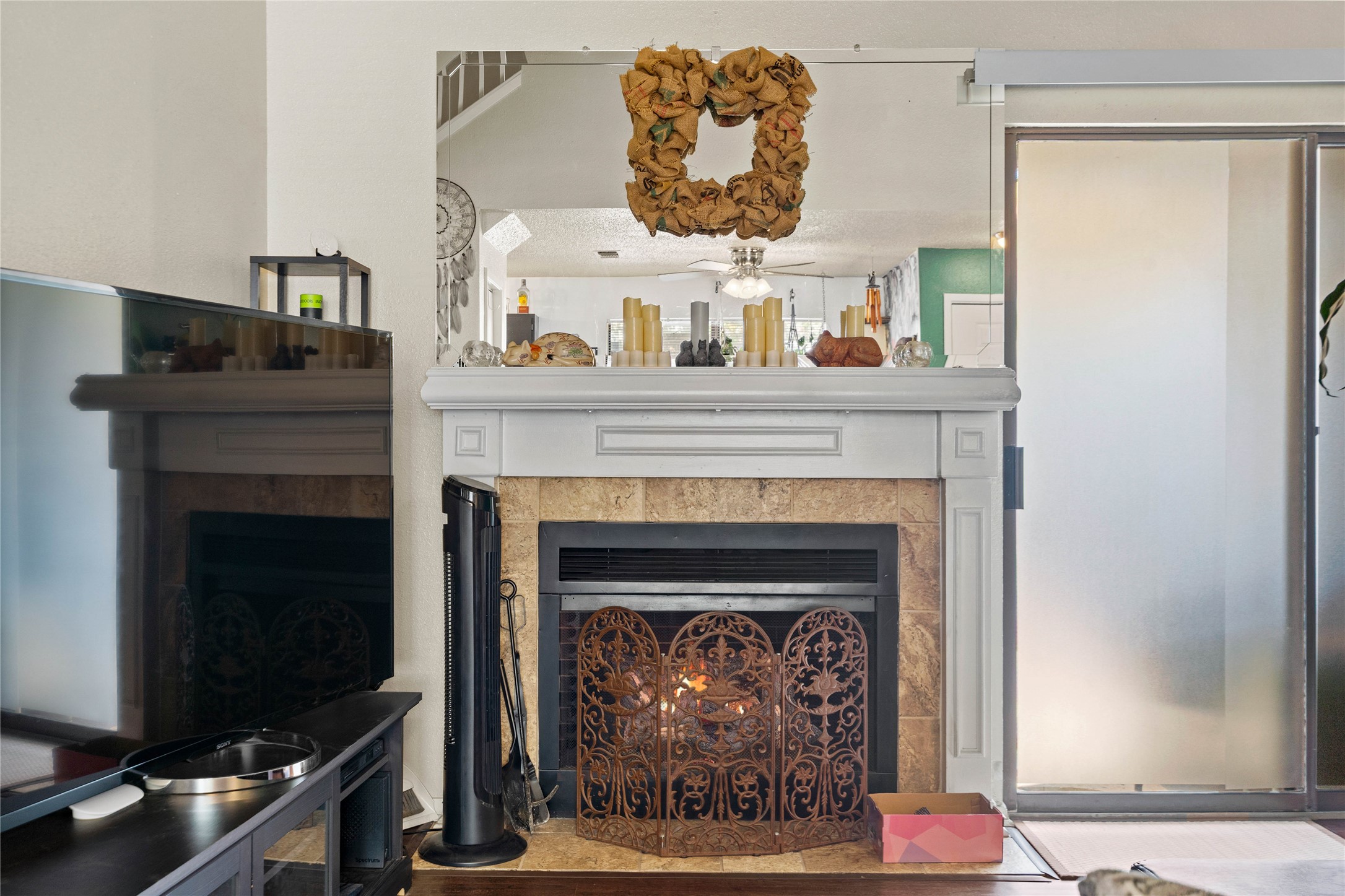 2018 West Rundberg Lane, Unit 4B Austin, TX 78758 - Photo 5 of 28 a living room with a fireplace with a fireplace