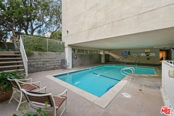 a view of a chairs and tables in the patio