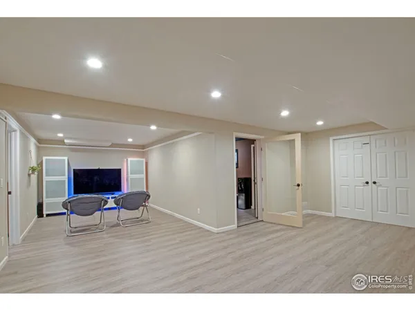 a bedroom with furniture and a fireplace