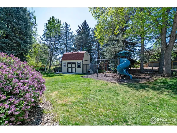 a view of a house with a big yard