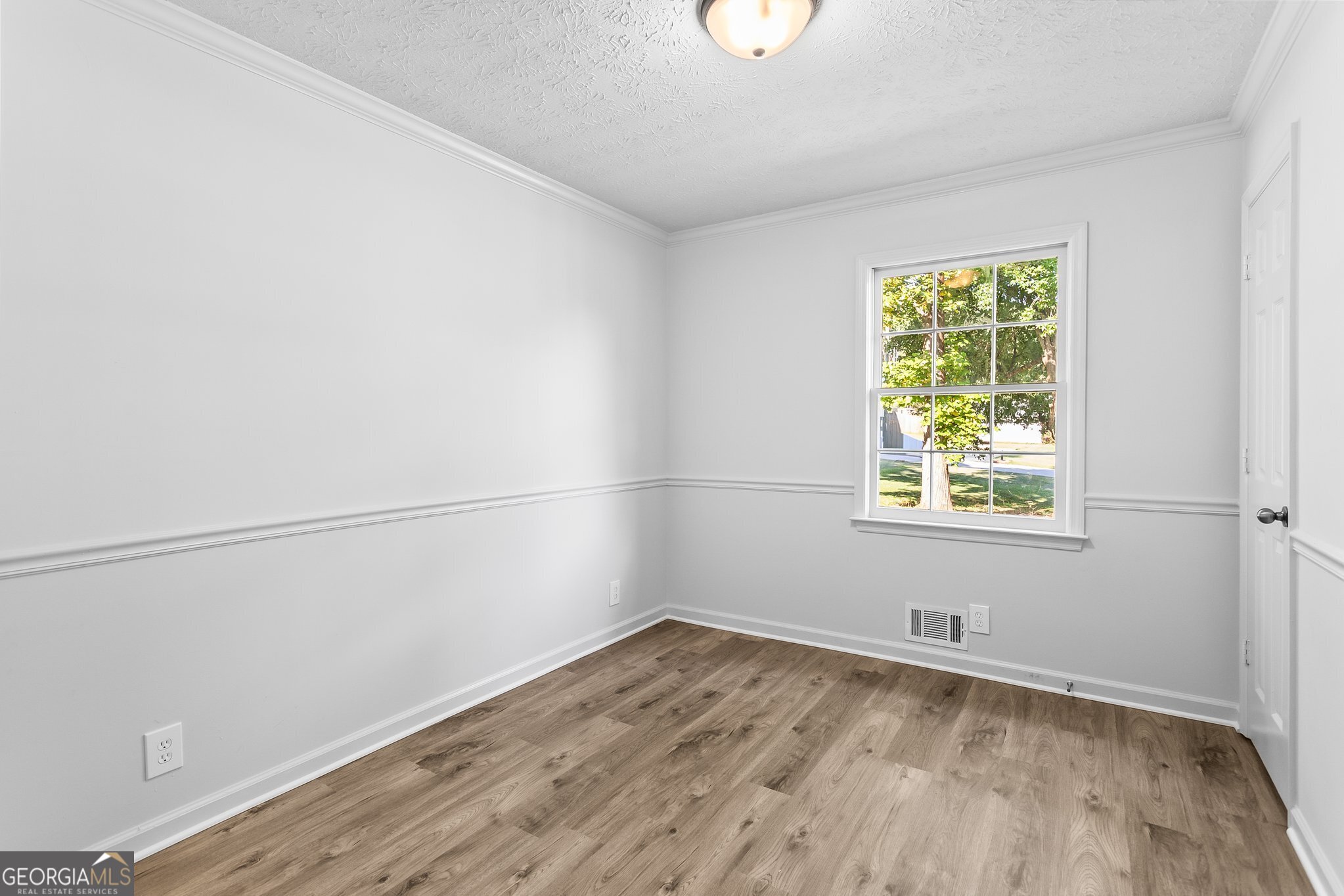 3620 Knoll Crest Trail Buford, GA 30519 - Photo 28 of 47 an empty room with a window